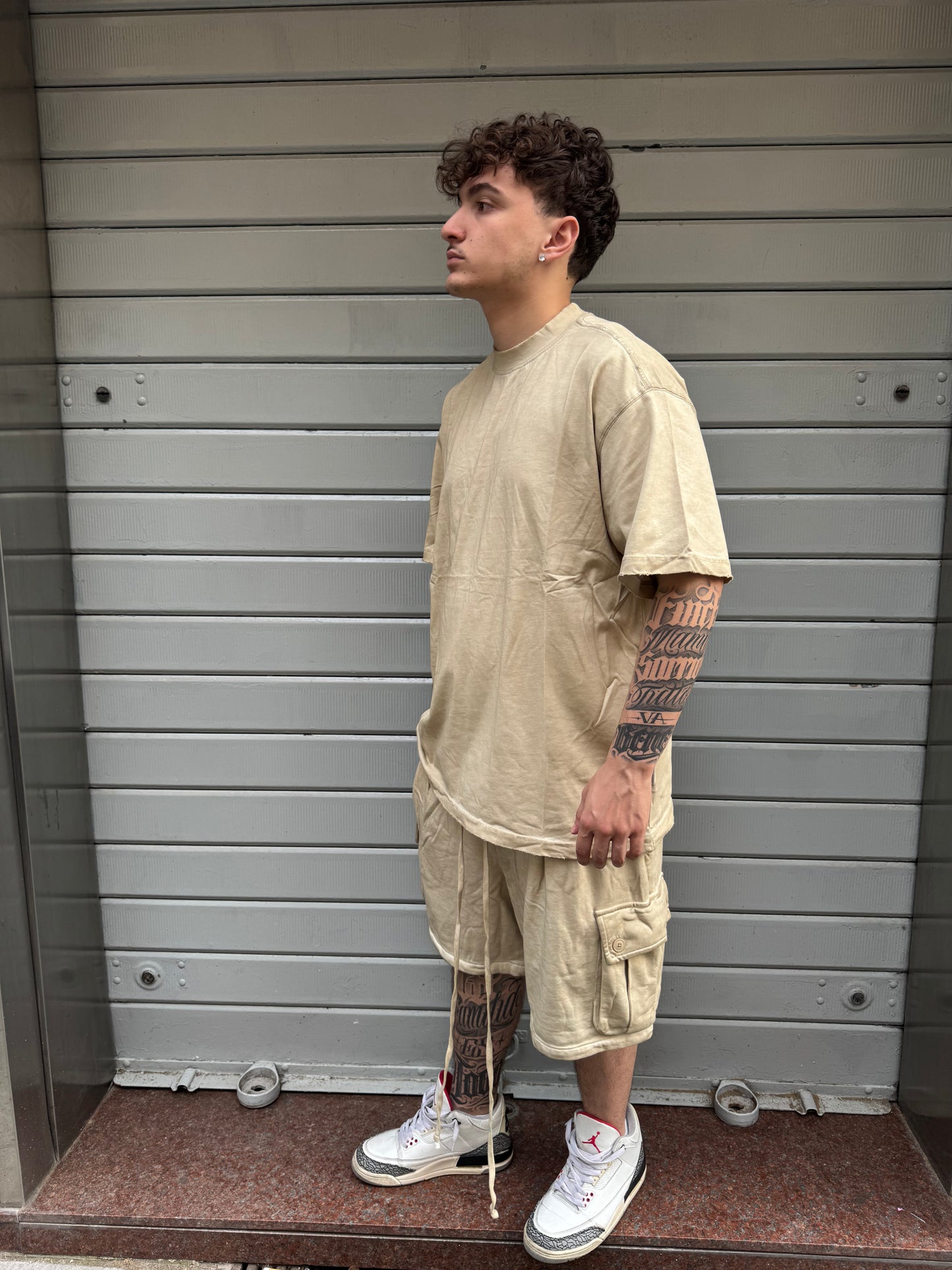 Bermuda con tasca laterale